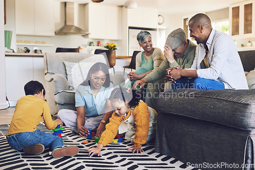 Image of Big family, love or happy children on floor with toys for playing, creative fun or bonding at home. Development, smile or kids enjoy building blocks games to relax with mom, dad or grandparents