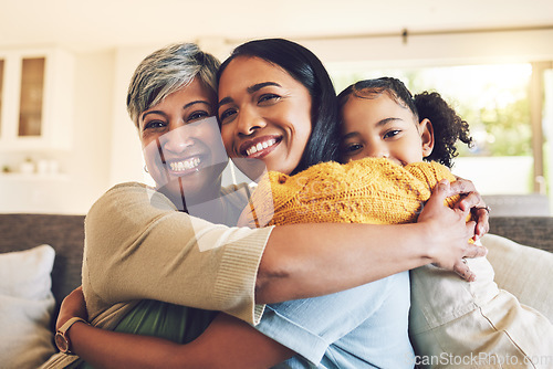 Image of Hug, portrait and a grandmother, child and mother with happiness, love and care on mothers day. Happy, house and a senior woman, mom and girl with embrace as family for support together on the sofa