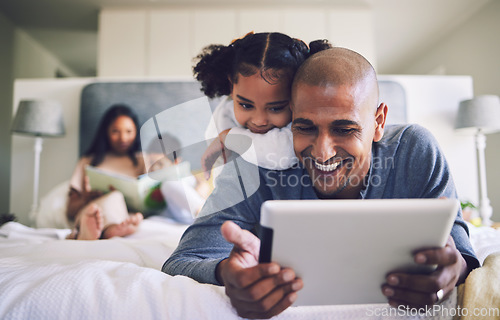 Image of Happy, cartoon and father and a child with a tablet in the bedroom for games, app or streaming a video. Smile, family and a dad and a little girl watching a film on tech for education on a house bed