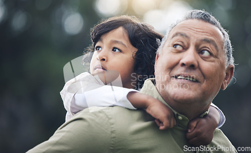 Image of Nature, care and a grandfather with a child and piggyback, thinking and looking at the view in a park. Smile, love and senior man with a kid in a backyard or garden with an idea or vision and hug