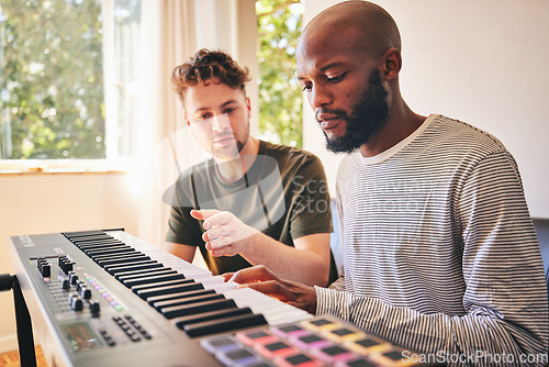 Image of Male student, learning and piano with teacher for education or creativity with diversity. Music, lesson and keyboard with black man and instructor or performance as artist in home with training.
