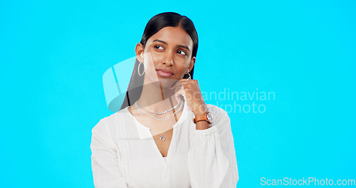 Image of Thinking, confused and ideas of woman isolated on blue background university choice, college or scholarship decision. Indian person contemplating, thoughtful and serious inspiration in studio mockup