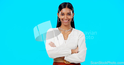 Image of Laughing, studio and Indian woman face with blue background feeling success. Business employee, motivation and happy portrait of a young female worker and professional isolated with happiness and joy