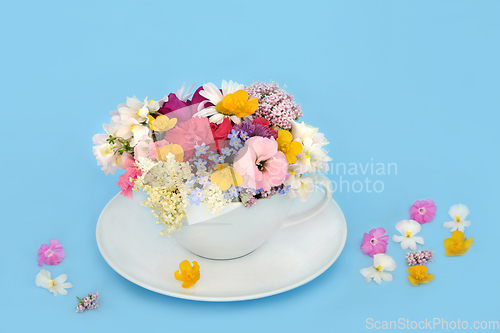 Image of Surreal Summer Flowers and Wildflowers Teacup Arrangement