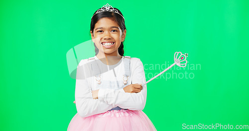 Image of Girl child, princess and face in green screen studio with smile, happiness and playing game for fantasy. Happy young female, royal aesthetic and fairytale portrait for costume party, games or fantasy