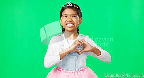 Image of Heart, green screen and love hand gesture by child excited, smile and excited isolated in studio background. Young, care and support sign by girl or kid in princess costume or tutu showing symbol