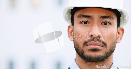 Image of Face of a contractor and maintenance manager at a construction site with copy space. Portrait of an engineer with a hardhat overseeing a successful project development