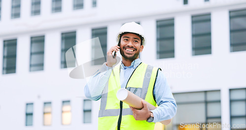 Image of Excited, confident and happy architect talking on phone, agreeing to building plan for office development in city. Cheerful, ambitious contractor or surveryor negotiating blueprint deal on technology