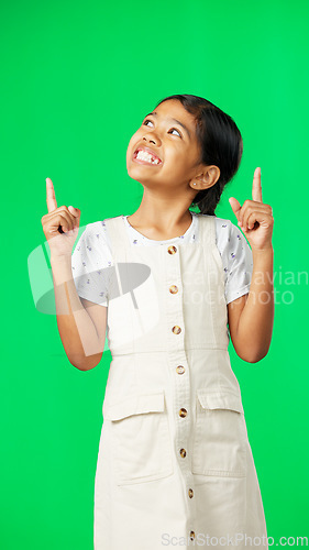 Image of Face, pointing and girl with motivation, green screen and choice with inspiration, happiness and show. Portrait, female child and young person with direction, decision and promotion with joy or smile