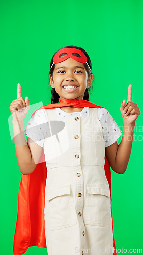 Image of Superhero, point and face of child on green screen for fantasy, cosplay costume and comic character. Advertising, copy space and portrait of kid in studio for freedom, fight crime and games mockup