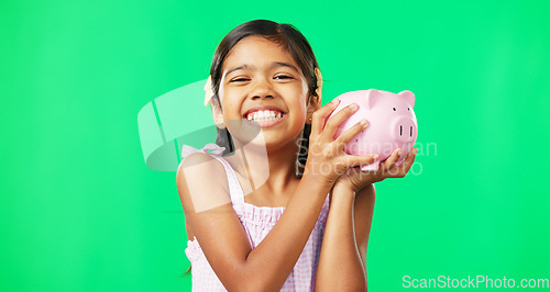 Image of Face, green screen and girl child with piggy bank in studio, happy and excited for savings on mockup background. Portrait, money and box by Mexican kid smiling for cash, growth or future planning
