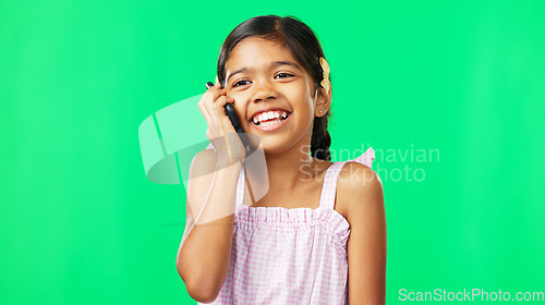 Image of Communication, green screen and girl with smile, phone call and connection against studio background. Female child, young person and happy kid with smartphone for conversation, signal and discussion