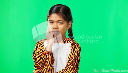 Image of Child, girl and thinking of idea on green screen background with mockup space for plan or choice. Indian kid portrait in studio with hand on chin to think, planning or brainstoming decision