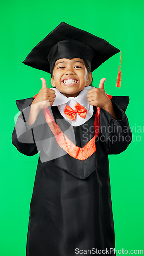 Image of Graduation, happy and face of a child with a thumbs up on a green screen isolated on a studio background. Success, achievement and portrait of an excited girl with an emoji sign for education