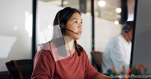 Image of Call center, woman and phone call, contact us with CRM, customer service or telemarketing sales, conversation and technology. Communication, headset and female call centre employee, help and computer