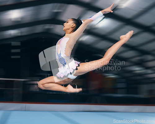 Image of Woman, gymnastics and jump in motion blur for performance, flexible skill and dancer. Female, rhythmic movement and stretching body mid air for action, creative talent and agility training in arena