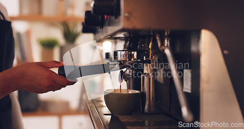 Image of Coffee machine, barista hands and woman in cafe, prepare latte or espresso drink with service and premium blend caffeine. Hot beverage, person working in restaurant and cup with brewing process