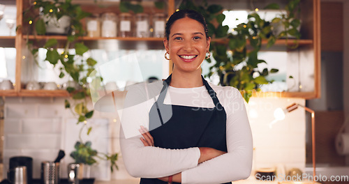 Image of Face, woman and barista with arms crossed, smile and confidence in store, success and waitress in cafe. Portrait, female employee or lady with happiness, entrepreneur or business owner in coffee shop