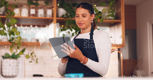 Image of Cafe barista or happy woman on tablet for ecommerce, online services and restaurant sales promotion. Small business owner, waitress or retail person on digital technology for coffee shop or cafeteria