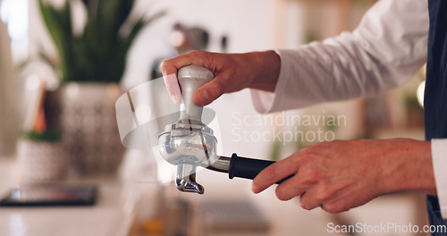 Image of Hands, barista and coffee maker with an employee working behind a kitchen counter in a cafe for service. Waiter, cafeteria and caffeine with a person making a drink at work in a restaurant