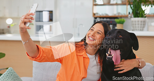 Image of Woman, dog and selfie on living room sofa in home for care hug, touch and embrace for happy friends. Doggy mom, couch and lounge for pet, animal or social media app with smile, relax and photography