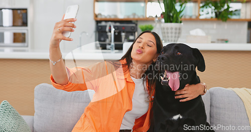 Image of Woman, dog and selfie on living room sofa in home for care hug, touch and embrace for happy friends. Doggy mom, couch and lounge for pet, animal or social media app with smile, relax and photography