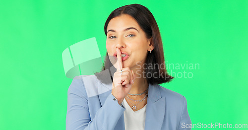Image of Green screen, secret and wink face of happy woman, privacy and finger on lips in studio. Portrait of female model, silence and smile for business surprise announcement, whisper emoji and mystery deal