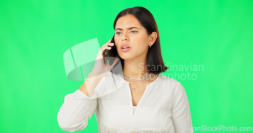 Image of Phone call, conversation and woman with green screen feeling angry and frustrated from crisis. Isolated, studio background and stress from a young female model with mobile and communication problem