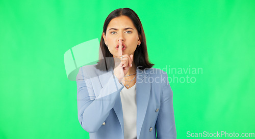 Image of Finger, lips and face of serious woman on green screen, studio or background of privacy. Business portrait, angry female worker and silence of noise, shush or hands on mouth in secret, quiet or emoji