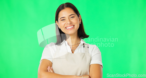 Image of Woman, happy and portrait on green screen with arms crossed mockup space with apron. Professional female with a smile for advertising business or startups choice or service on a studio background