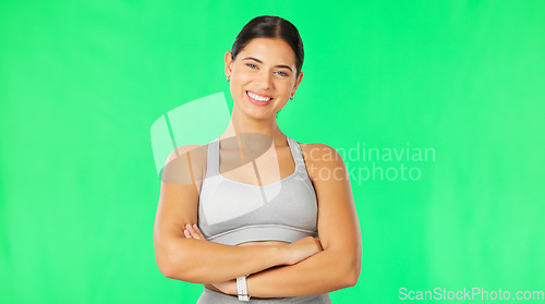 Image of Face, green screen and woman with fitness, arms crossed and training for wellness against a studio background. Portrait, female athlete and happy person with confidence, healthy lifestyle and workout