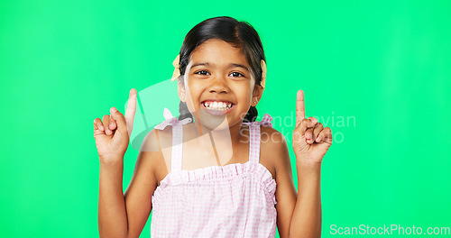 Image of Face, pointing and black girl with motivation, green screen and inspiration with joy, happiness and space. Portrait, African American female child or young person with gesture for direction or choice