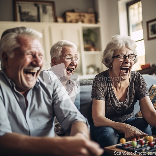 Image of Retirement, fun and a group of senior friends laughing while playing games together in the living room of a home. Happy, funny or bonding with mature men and woman enjoying comedy, laughter or humor