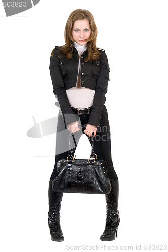Image of The young woman in a black suit. Isolated