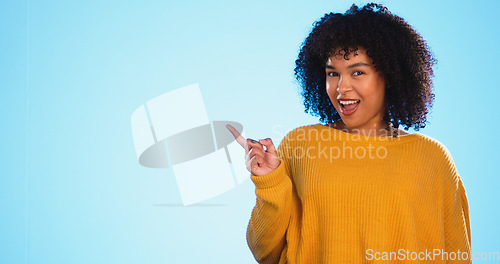 Image of Mock up, studio dance and woman point at sales promotion, present gift or discount deal mockup. Dancing, advertising space or marketing product placement with happy African girl on blue background