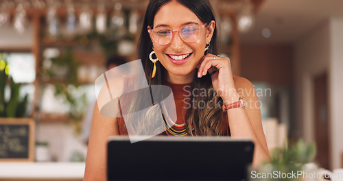 Image of Business woman, laughing or tablet in coffee shop, restaurant or cafe on video call, virtual meeting or webinar. Smile, happy or freelance entrepreneur on technology in funny presentation or planning