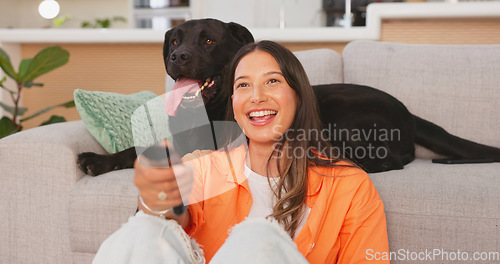 Image of Woman laughing and watching tv with her dog in living room for comedy show, streaming movie or film relax, happy and joy. Funny person watch television with puppy pet, animal or Labrador retriever