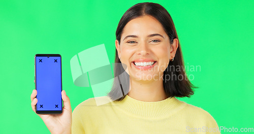 Image of Happy woman, phone and mockup on green screen with tracking markers for advertising against studio background. Portrait of female with smartphone display for advertisement or marketing on copy space