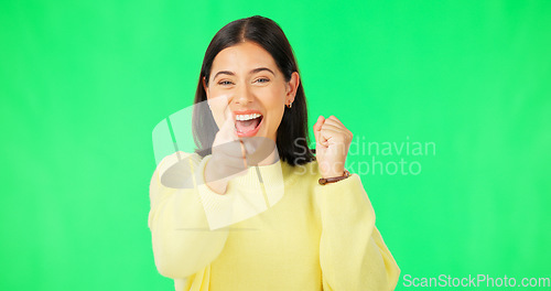 Image of Happy woman, celebration and pointing on green screen for winning, success or promotion against a studio background. Portrait of excited female in joy with finger point for choice on chromakey mockup