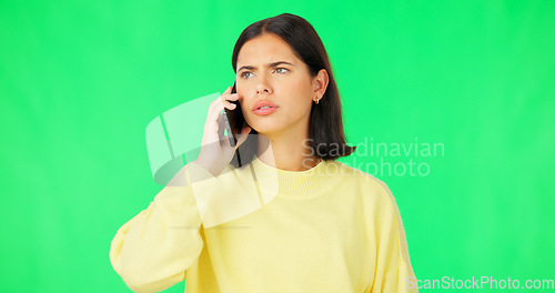 Image of Green screen, phone call and woman with anger, frustrated and stress against a studio background. Female, contact and person smartphone, mobile app and communication with conflict and annoyed girl