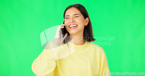 Image of Happy woman, phone call and conversation on green screen for communication against a studio background. Female talking on mobile smartphone in funny discussion laughing for fun joke or meme on mockup