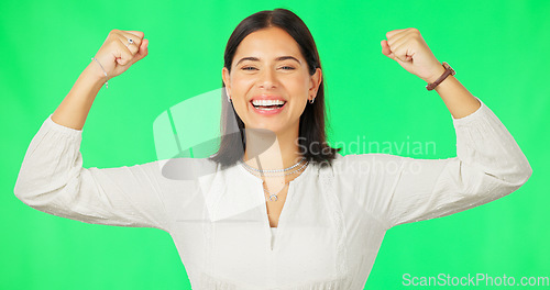 Image of Strong, green screen and happy woman isolated on studio background for gender equality fight, power and strength. Empowerment, feminism and face of young person face winning and celebration fist pump