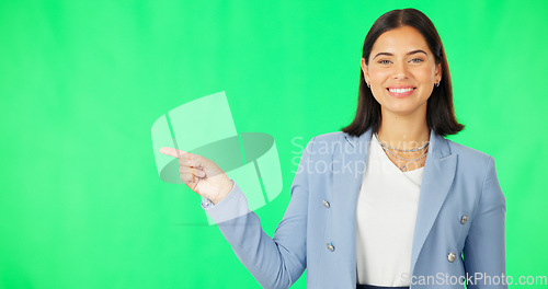 Image of Business woman, face and pointing with green screen, list or review option by studio background. Happy businesswoman, point and portrait with mock up space for menu, checklist or decision by backdrop