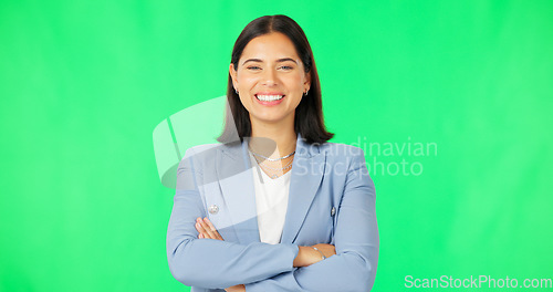 Image of Business, happy woman and face with arms crossed on green screen background for confidence. Portrait, smile and young female model, employee and empowerment of professional worker, happiness or pride