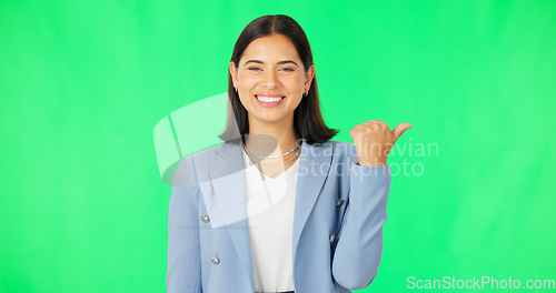 Image of Face, business and woman pointing, green screen and employee against studio background. Portrait, female entrepreneur and consultant with direction, showing space and promotion with happiness and joy