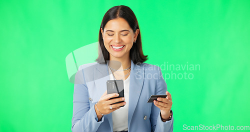 Image of Business woman, phone and credit card on green screen for online shopping, ecommerce or purchase against a studio background. Happy female on smartphone for transaction, banking or finance on mockup