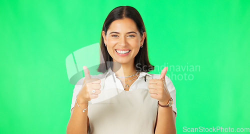 Image of Happy woman, hands and thumbs up on green screen for good job, agreement or winning against a studio background. Portrait of female smile showing thumb emoji, yes sign or like for winning on mockup