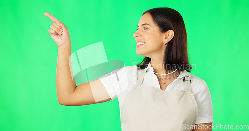 Image of Mockup, green screen and woman pointing at product placement space isolated in a studio studio background. Deal, sale and portrait of female showing advertising, marketing and a choice or option