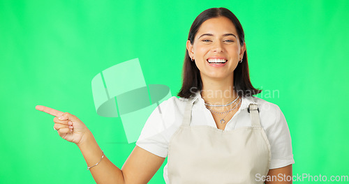 Image of Mockup, green screen and woman pointing at product placement space isolated in a studio studio background. Deal, sale and portrait of female showing advertising, marketing and a choice or option