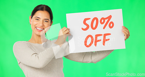 Image of Woman, face and discount sign on green screen, smile and advertising with poster, store promotion and sale. Portrait, billboard and cardboard with text, happy female with notice on studio background
